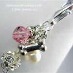 pink crystal dog bone pendant